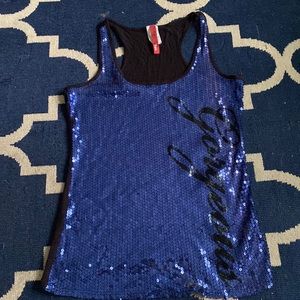 Blue sequin tank top from Topia. It says Gorgeous in black sequins on the side.